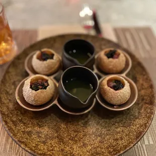 TUNA PUCHKA cilantro jaljeera, puri puffs, caviar, onions, chaat masala