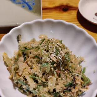 a bowl of rice and vegetables
