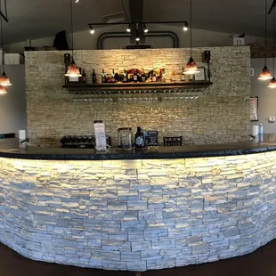 a stone bar in a winery