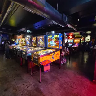 a row of pinball machines