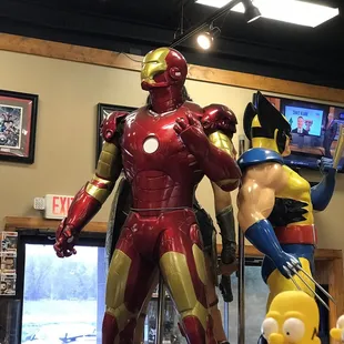 The huge Iron Man statue at the front of Jupiter Comics
