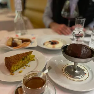 a plate of desserts and a cup of coffee