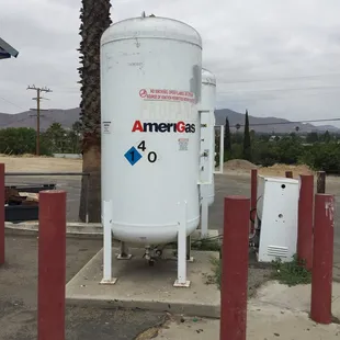 a white tank with american gas on it