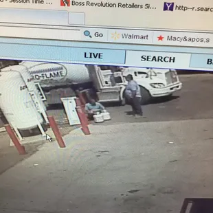 a man standing in front of a truck