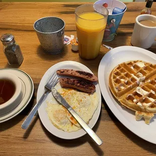 Waffles, 3 eggs, and chicken  sausage orange and a coffee! My go to. Can go wrong with place. I always will come here when in town!