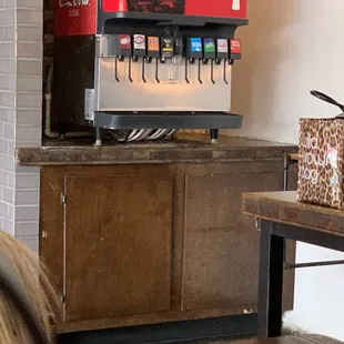  coca cola machine in a coffee shop