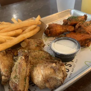 Lemon pepper/Buffalo hot wings /fries with ranch of course.