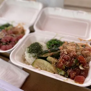 White rice, pickled cucumbers, seaweed salad, spicy poke and shoyu poke