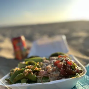  container of food on the beach