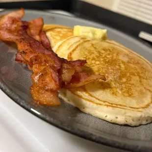 Who doesn't love breakfast, and when you don't have to make it yourself it's that much sweeter!  Pancakes and bacon