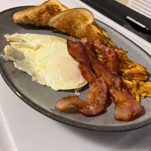 Eggs your way.  With toast and breakfast potatoes, bacon or sausage.