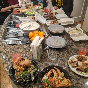a family sitting around a kitchen table