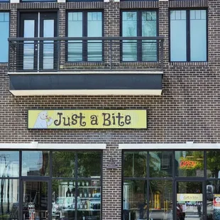 Outside with our new sign.