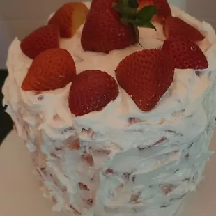 a cake with strawberries on top