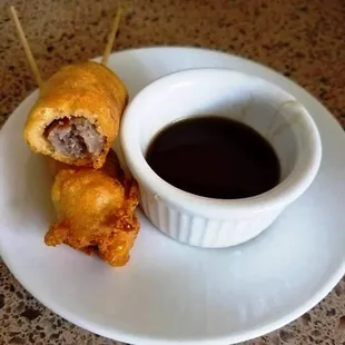 Our Sausage on a Stick, served with Maple Syrup