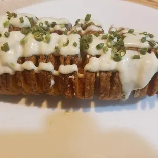 Our Potato Tornado, shown topped with Mexican Crema and Chives