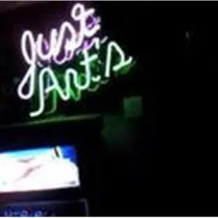 a neon sign for a bar