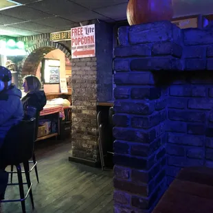 people sitting at a bar