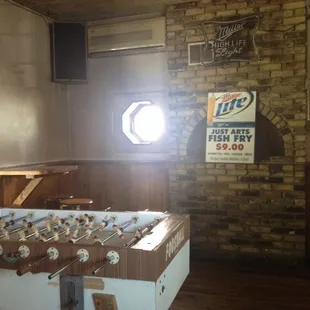 a foo - pong table in a pub