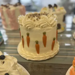 a variety of carrot cakes on display