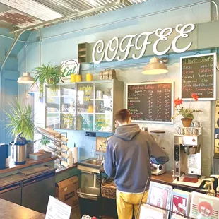 a man in a coffee shop