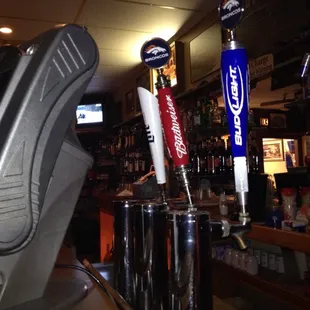 a row of beer taps