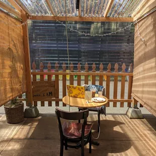The view looking into my section of the sidewalk hut. Pretty spacious, tables have 2-4 chairs depending, pretty private too.