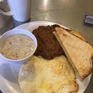 Chicken-fried steak, gravy on the side, over-medium eggs and sourdough. Coffee is excellent.