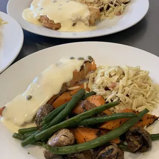 Grilled salmon, orzo and grilled green beans, carrots and mushrooms