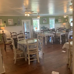 a tea room with tables and chairs