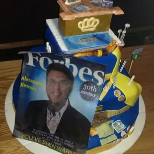 30th birthday cake for owner of Crown Jewelers in San Marco (on Forbes cover) cake shows life story from birth to entrepreneur