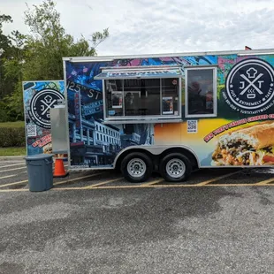 a food truck parked in a parking lot
