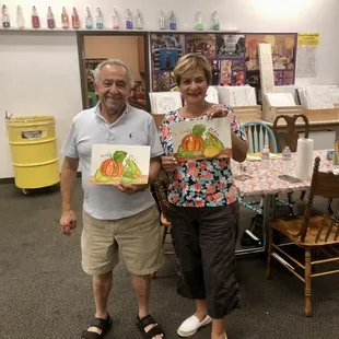 Showing off their Water color painting after class at Just For Fun Art