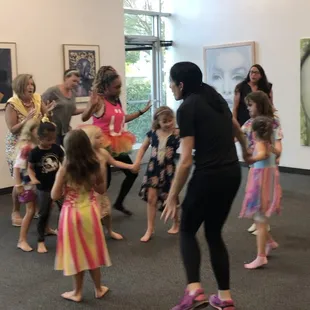 Dancing and games while taking a break from painting at Just For Fun Art birthday party