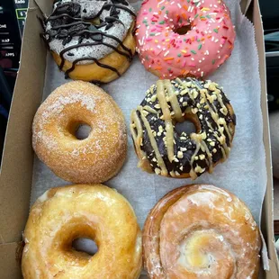a variety of donuts in a box