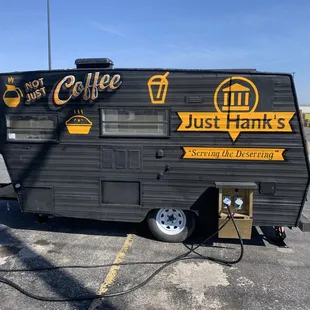 a coffee truck parked in a parking lot