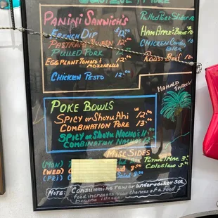 a menu on the wall of a restaurant