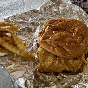 Fried pork tenderloin and fries