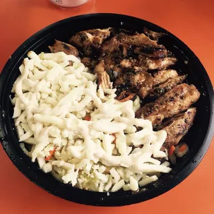 Spicy Jerk Chicken Bowl with Beans and Rice and Caribbean Slaw