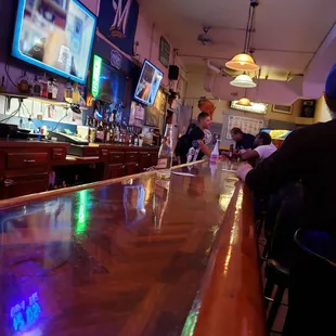 people sitting at a bar