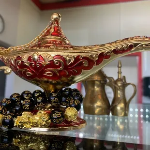 a gold and red lamp