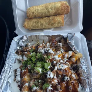 a container of food with a roll in it