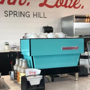 a blue coffee machine