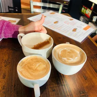 Chai tea latte (top left), Toffee Coffee latte (top right), White Chocolate Tiramisu latte (bottom center)