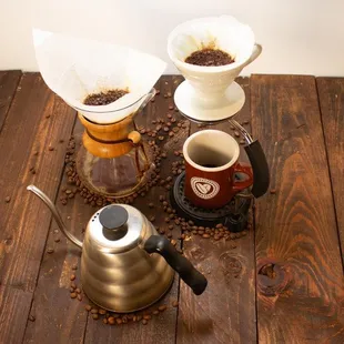 a coffee driper, coffee filters, and coffee beans