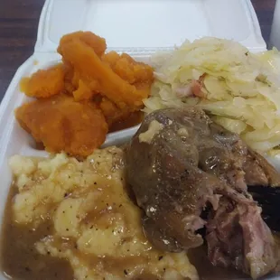 Ham hocks(2 big ones), cabbage, yams, and mashed potatoes with gravy.