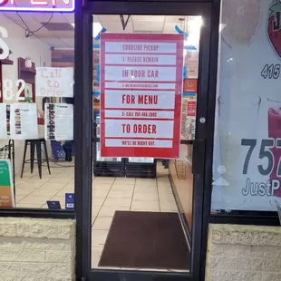 a sign in a store window