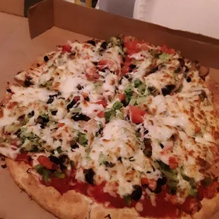 a pizza in a pizza box