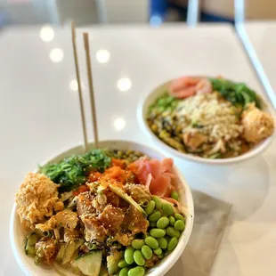 two bowls of food on a table