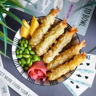 a plate of fried shrimp sticks